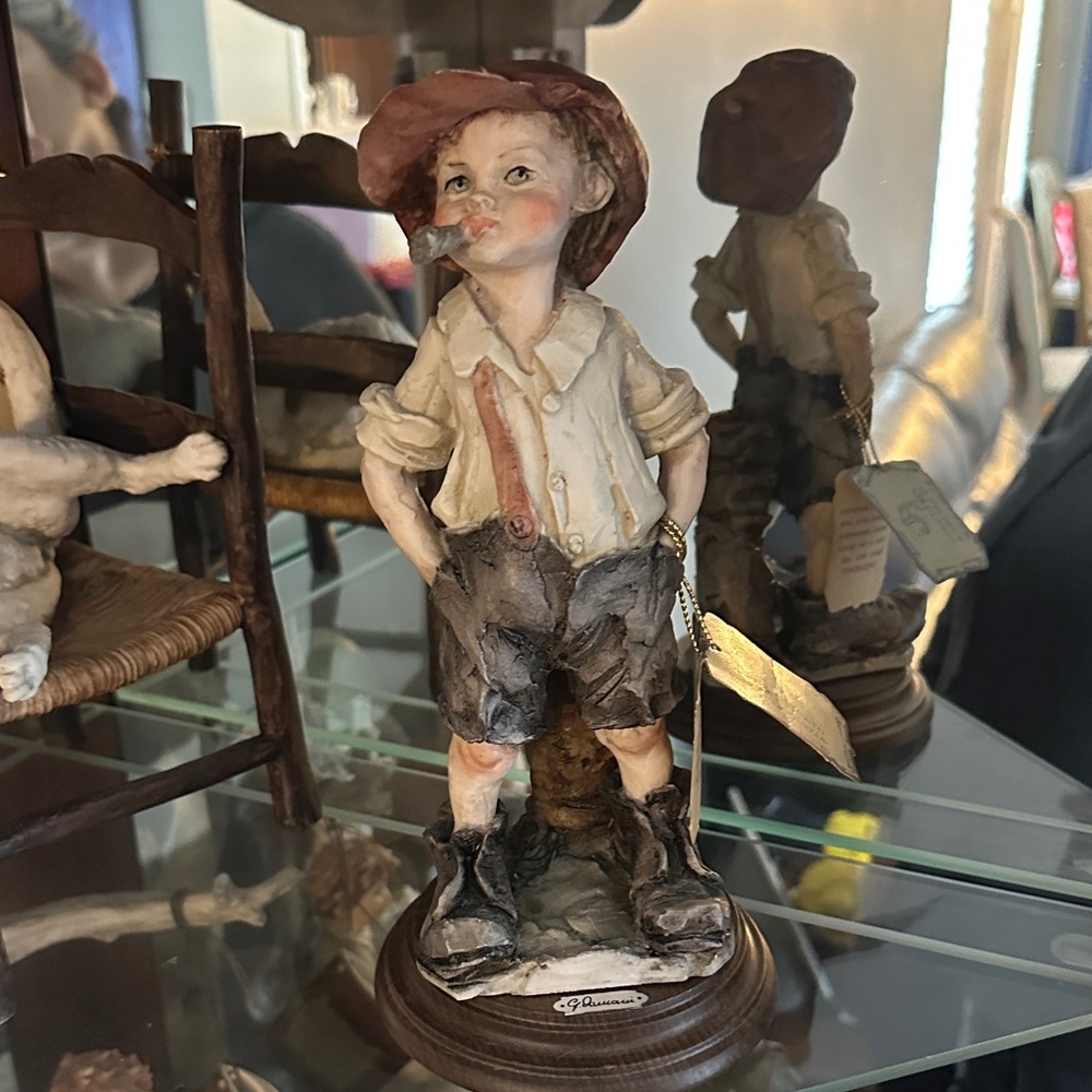 Whimsical Boy Sculpture with Hat